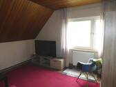 Wohnzimmer im Dachgeschoss - 