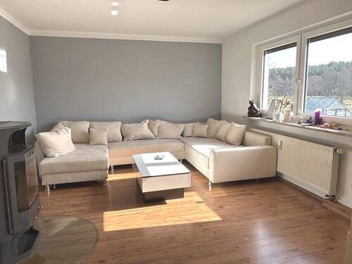 Wohnzimmer mit Ofen und... - 