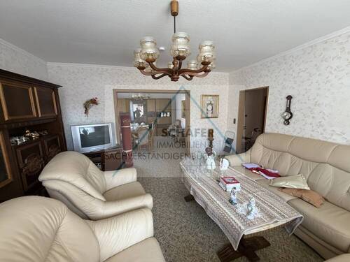 Wohnzimmer - Bungalow mit 130,00 m&sup2; in Twistringen zum Kaufen