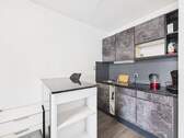 Küche - Charmante Einzimmerwohnung mit Balkon