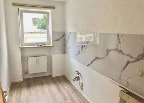Bild 3 - 4 Zimmer Etagenwohnung in Weilheim