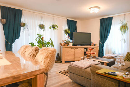 Wohnzimmer - Stilvolles Wohnen in Vollmarshausen - Ihre exklusive Erdgeschosswohnung mit Terrasse und hochwertiger Ausstattung zum Bestpreis!