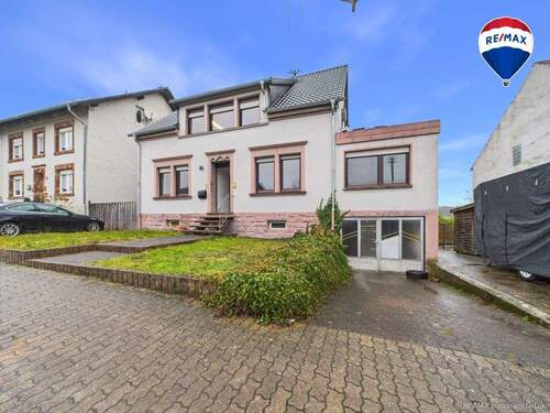 REMAX Immobilien DeLux Haus in Weiskirchen - Rappweiler zu verkaufen - 7 Zimmer Einfamilienhaus zum Kaufen in Weiskirchen / Rappweiler