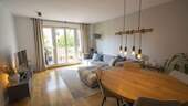 Wohnzimmer - Bezugsfreie Traumwohnung mit moderner Einbauküche am Arnulfpark