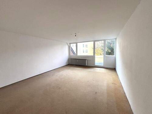 Wohnzimmer - Etagenwohnung mit 76,60 m&sup2; in Garbsen zum Kaufen