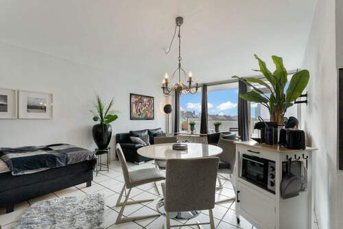 Wohn-, Essbereich - Exklusives City-Apartment in Düsseldorfs Bestlage