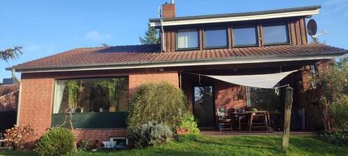 Hausansicht Westen - Charmantes, familienfreundliches Einfamilienhaus mit wunderschönem Garten, ideal für Selbstversorger! - in Toplage