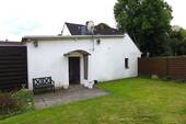 Rückansicht Garage und Carportanlage - 