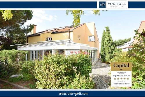 Titelbild - Stilvolles Einfamilienhaus mit schönem Wintergarten und Einliegerwohnung