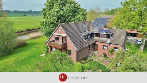 Haus zu verkaufen in Bremen Strom – H & T Immobilien - Naturverbunden leben mit Blick über die Ochtum