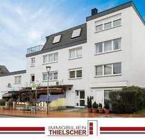 Attraktive Eigentumswohnung mit Dachterrasse und Garage in gepflegtem Wohn- und Geschäftshaus - Übach-Palenberg