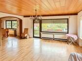 EG Wohnzimmer mit Balkon - Einfamilienhaus mit 155,90 m² in Bad Marienberg zum Kaufen