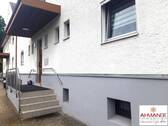 Bild 1 - Ohne Renovierungsstau - Helle Dachgeschoßwohnung mit Stellplatz und Gartenanteil