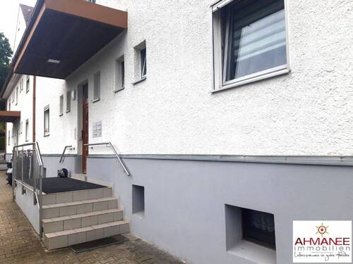 Bild 1 - Ohne Renovierungsstau - Helle Dachgeschoßwohnung mit Stellplatz und Gartenanteil
