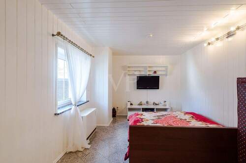 Freundliches Gästezimmer im Dachgeschoss - 