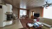Wohnzimmer mit Kamin - Einfamilienhaus mit 169,60 m&sup2; in Oschatz zum Kaufen