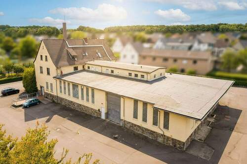 Luftaufnahme - Vollvermietetes MFH und große Gewerbehallen inkl. Büros in Buchholz nahe A3