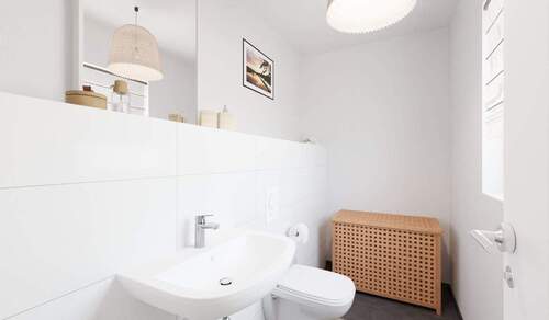Modern gefliestes Gäste-WC im Erdgeschoss - 