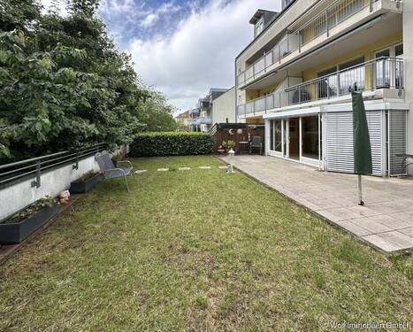 Außenansicht Gartenseite - 3 Zimmer Etagenwohnung zum Kaufen in Karben