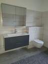 Waschtisch und WC - 