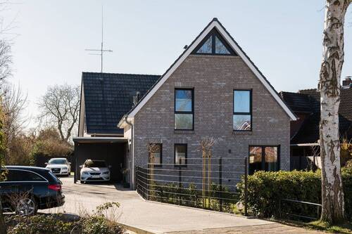 Referenzobjekt - Neubau in Ofenerdiek: Zeitlose Architektur trifft auf moderne Wohnqualität