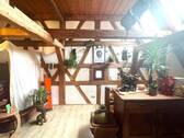 Offenes Fachwerk im Obergeschoss - 