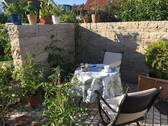 Kleiner Sitzplatz im Süden - Kleine Oase - Reihenmittelhaus mit Gärtchen in IN-Süd