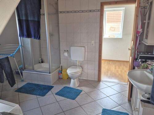 Bad DG - Einfamilienhaus mit 146,30 m² in Butjadingen / Stollhamm zum Kaufen