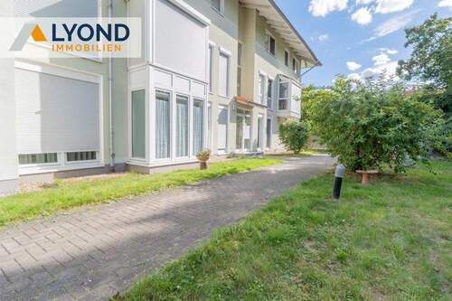 Hausansicht 1 - Gepflegte 1-Zimmer-Wohnung mit Tiefgaragenstellplatz