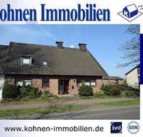 Hier ist Platz für die ganze Familie: Wohnhaus mit Einliegerwohnung und Bauland in 41379 Brüggen