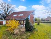 Außenansicht (Gartenseite) - Einfamilienhaus in Hude-Nord: Durchdachter Grundriss trifft auf zentrale Lage!