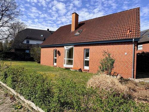 Außenansicht (Straßenseite) - 4 Zimmer Einfamilienhaus zum Kaufen in Hude