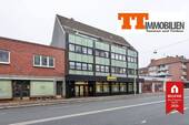 Außenansicht - Zentral wohnen in Heppens: 3-Zimmer-Eigentumswohnung mit Laubengang und Stellplatz!