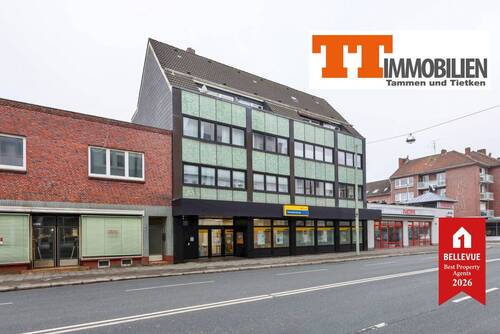 Außenansicht - Zentral wohnen in Heppens: 3-Zimmer-Eigentumswohnung mit Laubengang und Stellplatz!