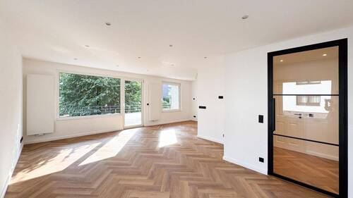 Wohnzimmer - Neubau im Altbau - exklusiv sanierte Wohnung im Herzen Unterbachs