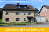 Freistehendes Zweifamilie mit einer Doppelgarage - Freistehendes Zweifamilienhaus (bis 4 WE) mit einem großen Wintergarten und 3 Pkw-Garagen
