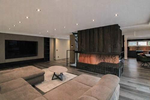 Wohnzimmer - Exklusive Wohnimmobilie mit vielfältigen Nutzungsmöglichkeiten und luxuriöser Ausstattung