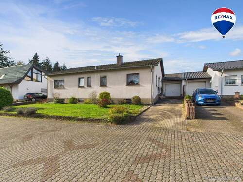 RE/MAX Immobilien DeLux Einfamilienhaus Merzig-Besseringen - Charmantes Einfamilienhaus mit großzügigem Garten