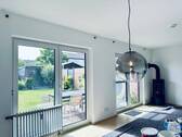 Der Wohnraum mit Zugang zum Garten - 