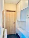 Der Eingangsbereich mit Garderobe - 