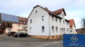 Außenansicht - 5-ZKB Maisonettewohnung mit großem Balkon und PKW-Stellplatz in Alheim-Niederellanbach.