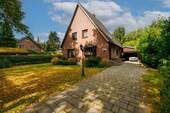 Straßenansicht - 4 Zimmer Einfamilienhaus zum Kaufen in Ahrensburg
