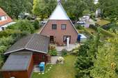 Gartenansicht / Luftbild - Einfamilienhaus mit 98,00 m² in Ahrensburg zum Kaufen