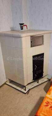 Kachelofenseite in der Küche2 - 6 Zimmer Reihenmittelhaus in Fürth