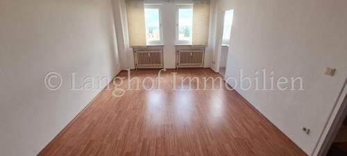 Wohnzimmer - SOFORT BEZUGSFREI: Moderne 1-Zimmerwohnung in zentraler Lage mit TG-Stellplatz