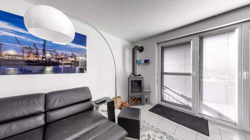 Wohnbereich mit Kamin - 4 Zimmer Reihenmittelhaus zum Kaufen in Karlsruhe