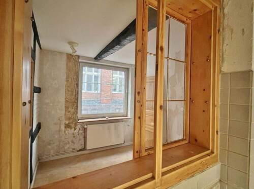 Blick aus der Küche ins Zimmer EG - Mehrfamilienhaus, Wohnhaus mit 52,90 m&sup2; in Lübeck zum Kaufen