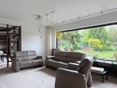 Wohnzimmer mit Blick in den Garten - 