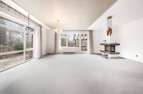 Wohnzimmer Hauptwohnung mit Kamin - 