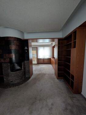 Wohnzimmer mit Kamin - Doppelhaushälfte mit 130,00 m&sup2; in Zeuthen zum Kaufen